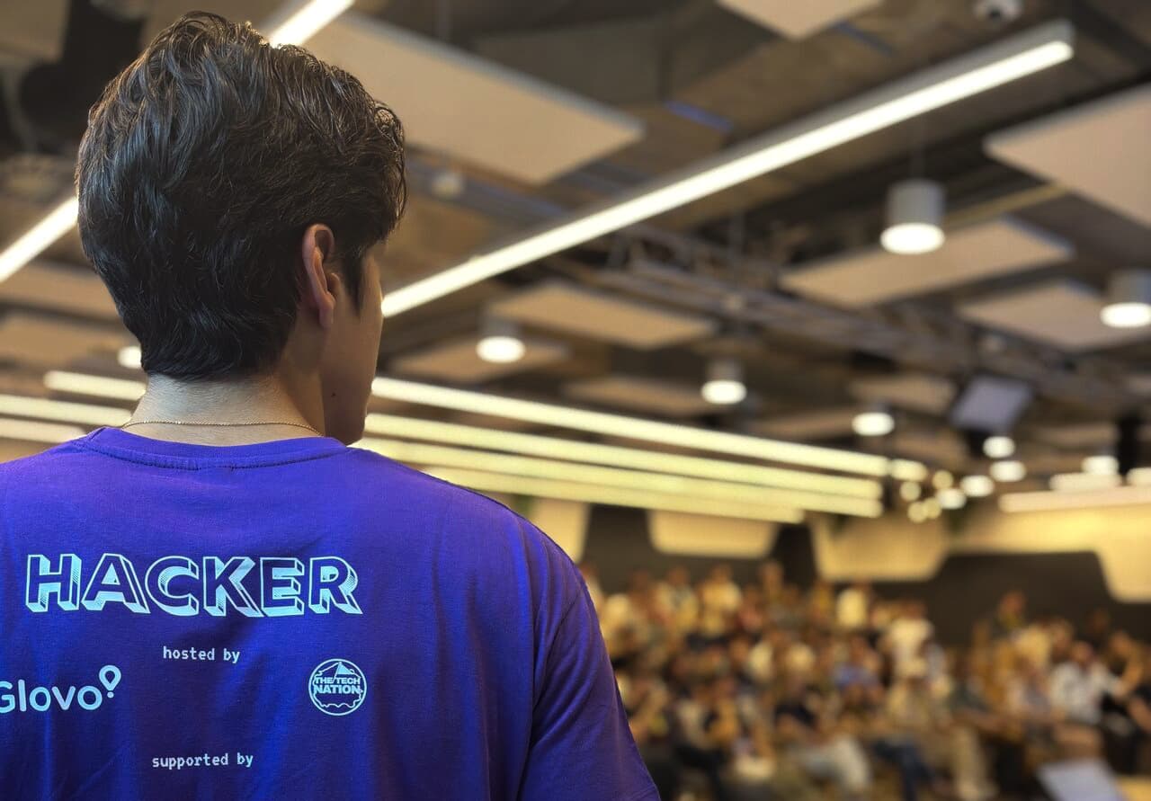 AI Hackathon — participants and audience at the builder arena