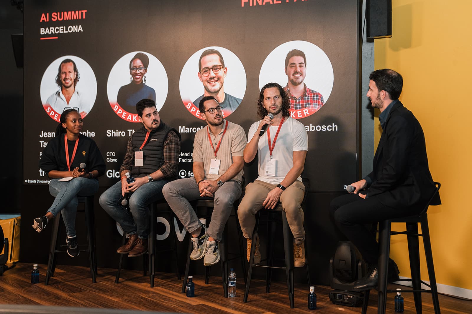 An expert panel on stage at AI Summit Barcelona