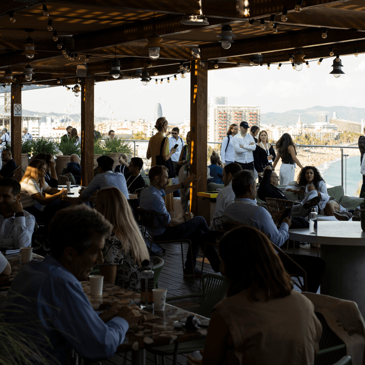 Norrsken House Barcelona, rooftop terrace with the city and sea in the background